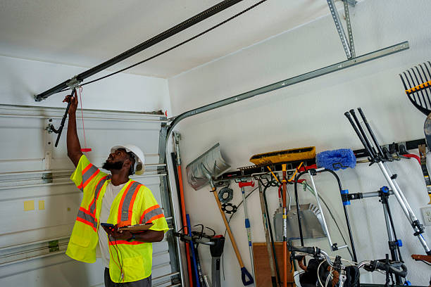 Professional Garage Door Panel Replacement technician working in Caraway, AR